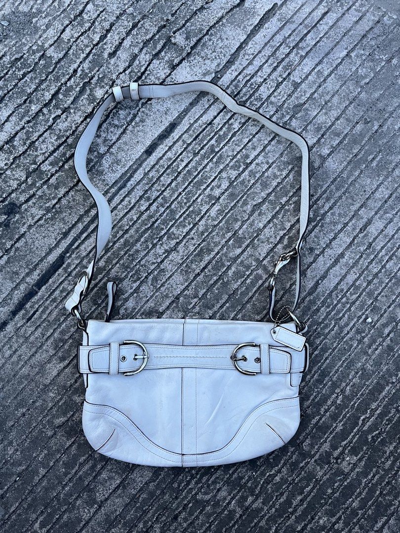 VINTAGE COACH SOHO BAG (Category: Shoulder Bags) located in General Santos City (Dadiangas). Submitted by bornstiborns (Listing ID 1458007768, Image 1). Description: - Stylis - Durable canvas material - Spacious interior - Classic and versatile design.