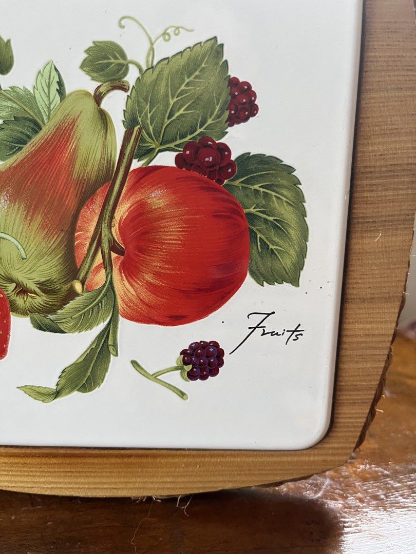 Vintage Fruit Design Serving Tray with Woven Handle (Category: Other Kitchenware & Tableware) located in Taguig. Submitted by minmin_parker (Listing ID 1457956612, Image 3). Description: - Charming vintage serving tray - Features a delightful fruit illustration (strawberries, apples, pears) - Convenient woven rope handle for easy carrying - White ceramic insert complemented by a sturdy wooden frame - Ideal for serving snacks or as a decorative ac