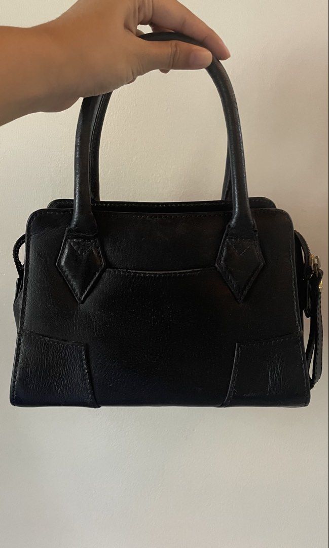 Vivienne Westwood handbag (Category: Purses & Pouches) located in Bulacan. Submitted by 017vic (Listing ID 1457923172, Image 2). Description: •she’s pretty scuffed up (very well loved), so please keep that in mind .