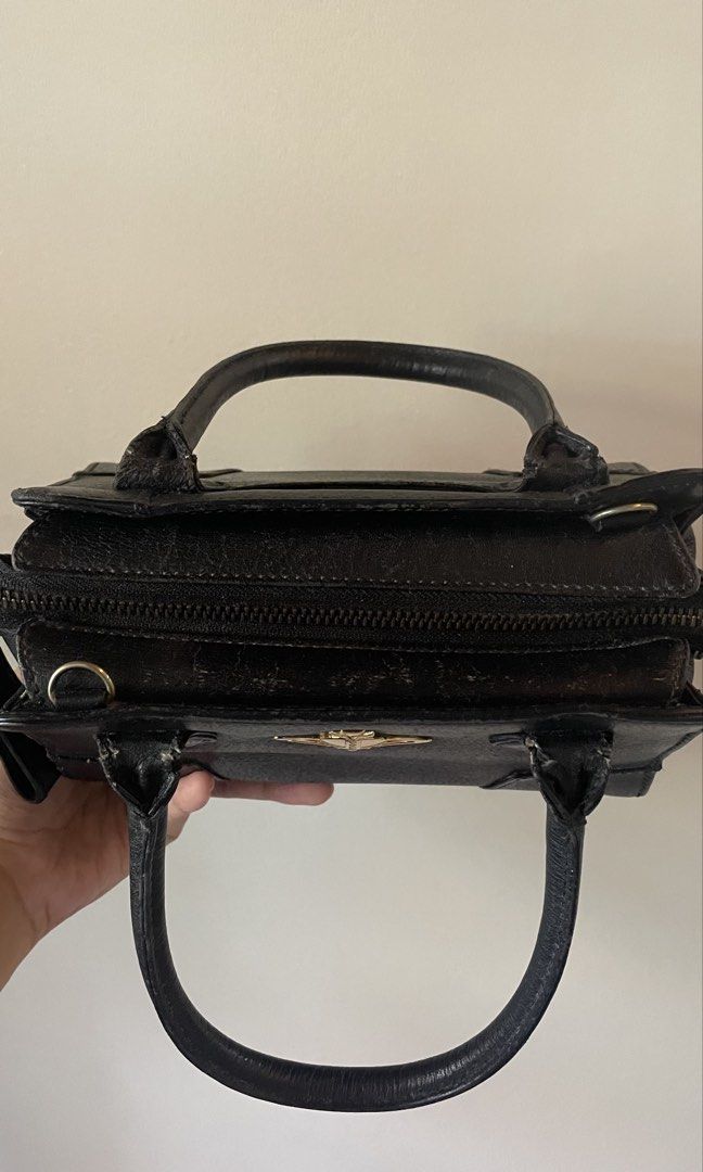 Vivienne Westwood handbag (Category: Purses & Pouches) located in Bulacan. Submitted by 017vic (Listing ID 1457923172, Image 3). Description: •she’s pretty scuffed up (very well loved), so please keep that in mind .
