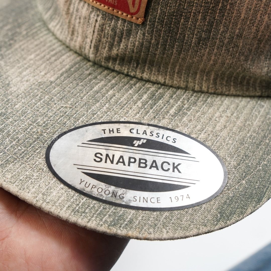 Volcom Snapback Cap - The Classics Yupoong (Category: Caps & Hats) located in Caloocan City. Submitted by jiggyj01 (Listing ID 1458039854, Image 3). Description: - Classic Volcom logo patch on front - Unique faded green and beige corduroy-like texture - Adjustable Yupoong Classics snapback closure - One size fits most.