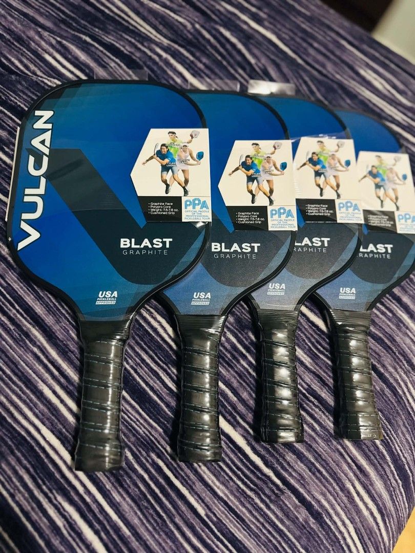 VULCAN Blast Graphite Pickleball Paddle (Category: Racket and Ball Sports) located in Valenzuela. Submitted by blakeys_atbp (Listing ID 1457947841, Image 3). Description: - VULCAN Blast Graphite Pickleball Paddle - Ideal for all-court players - Delivers power, control, and spin - Balanced feel with a comfortable cushioned grip - Graphite face and 9mm polymer core - Lightweight: 7.5-7.8 oz - USA Pickleball approved.