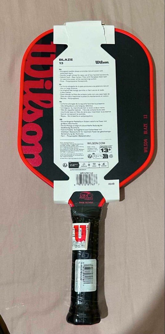 Wilson Blaze 13 Pickleball Paddle (Category: Racket and Ball Sports) located in Antipolo. Submitted by ninofranco (Listing ID 1457987334, Image 2). Description: - Raw Carbon Surface: Achieve maximum spin on your shots. - Elongated Paddle Shape: Offers a natural power boost and improved maneuverability. - Double-Layer Base: Enhanced durability and performance. - USA Pickleball Approved: Ready for official play. - Made in China. - Bought in US.