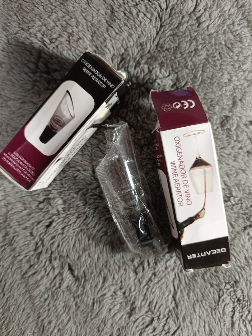 Wine Essentials (Category: Other Kitchenware & Tableware) located in Baguio. Submitted by cracklin.aniue26 (Listing ID 1457977571, Image 2). Description: Selling as set - Set of wine accessories perfect for wine enthusiasts. - Includes two brand new wine aerators in original packaging. (Packaging are creased and has corner bents) MIB. - Comes with a black corkscrew. - La Madelaine Cantina Umbra Not sealed, minimal sign of usage, good condition - 