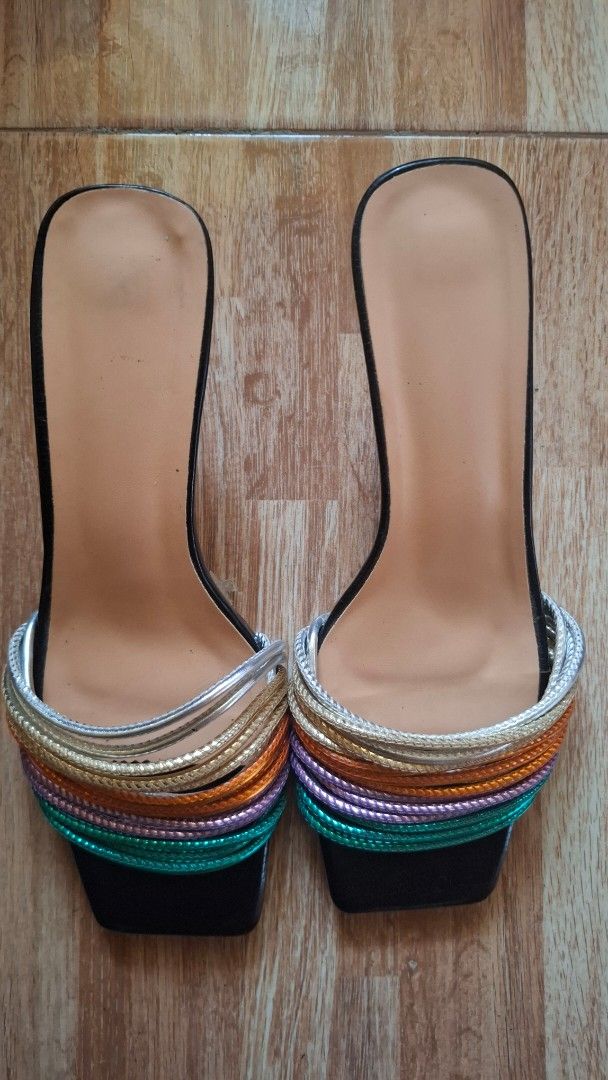 Women's Square Toe Multi-Strap Heeled Sandals (Category: Flats & Sandals) located in Tuguegarao City. Submitted by mondreigon (Listing ID 1457927670, Image 1). Description: size 39 pre loved Chic metallic multi-strap sandals with a square toe and thin heel. Perfect for adding a pop of color to any outfit! Soles show some wear..