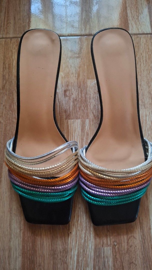 Women's Square Toe Multi-Strap Heeled Sandals (Category: Flats & Sandals) located in Tuguegarao City. Submitted by mondreigon (Listing ID 1457927670, Image 2). Description: size 39 pre loved Chic metallic multi-strap sandals with a square toe and thin heel. Perfect for adding a pop of color to any outfit! Soles show some wear..