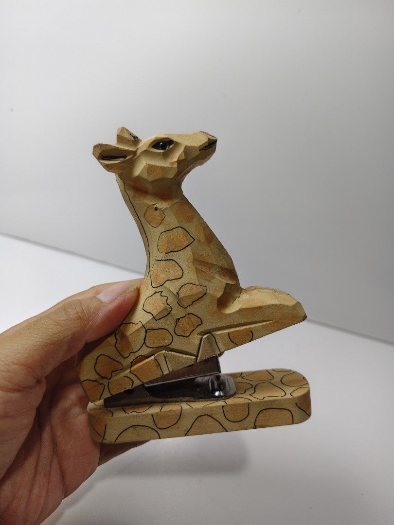 Wooden Giraffe Stapler Desk Accessory (Category: Stationery & School Supplies) located in Las Pinas. Submitted by mommy_14 (Listing ID 1458067319, Image 3). Description: - Adorable giraffe-shaped wooden stapler - Hand-carved design with painted spots - Adds a fun, unique touch to your desk - Functional metal stapler mechanism - Ideal for office or home stationery.
