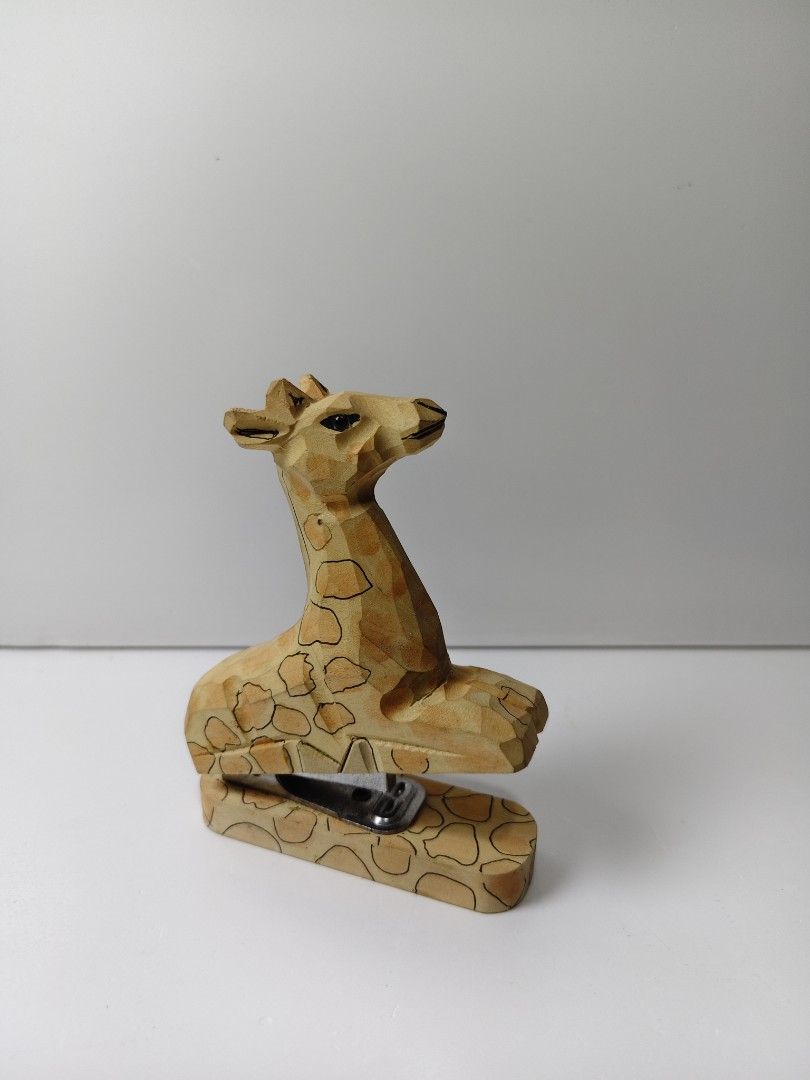 Wooden Giraffe Stapler Desk Accessory (Category: Stationery & School Supplies) located in Las Pinas. Submitted by mommy_14 (Listing ID 1458067319, Image 2). Description: - Adorable giraffe-shaped wooden stapler - Hand-carved design with painted spots - Adds a fun, unique touch to your desk - Functional metal stapler mechanism - Ideal for office or home stationery.