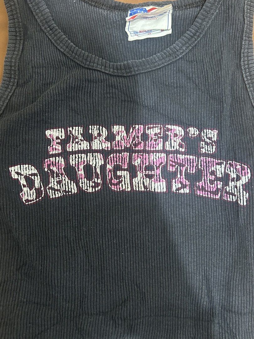y2k graphic tank top (Category: Sleeveless) located in Dumaguete. Submitted by hellograbs (Listing ID 1457998679, Image 2). Description: Fits xs-s 100% cotton Luv the graphic text “farmers daughter” it’s vintage and listtings on ebay for this brand goes up to $100 .