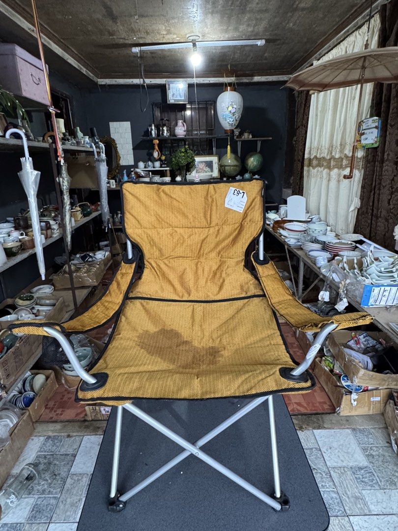 Yellow Camping Folding Chair with Cup Holder (Category: Chairs) located in Sual. Submitted by wakusurplus07031121 (Listing ID 1457963486, Image 2). Description: - Portable folding chair, ideal for camping and outdoor events. - Built-in cup holder on the side. - Folds compactly for easy storage and transport. - Sturdy metal frame. - mustard yellow fabric with black trim. -super lambot upuan - Ready for your next adventure! -malaki po siya sa perso
