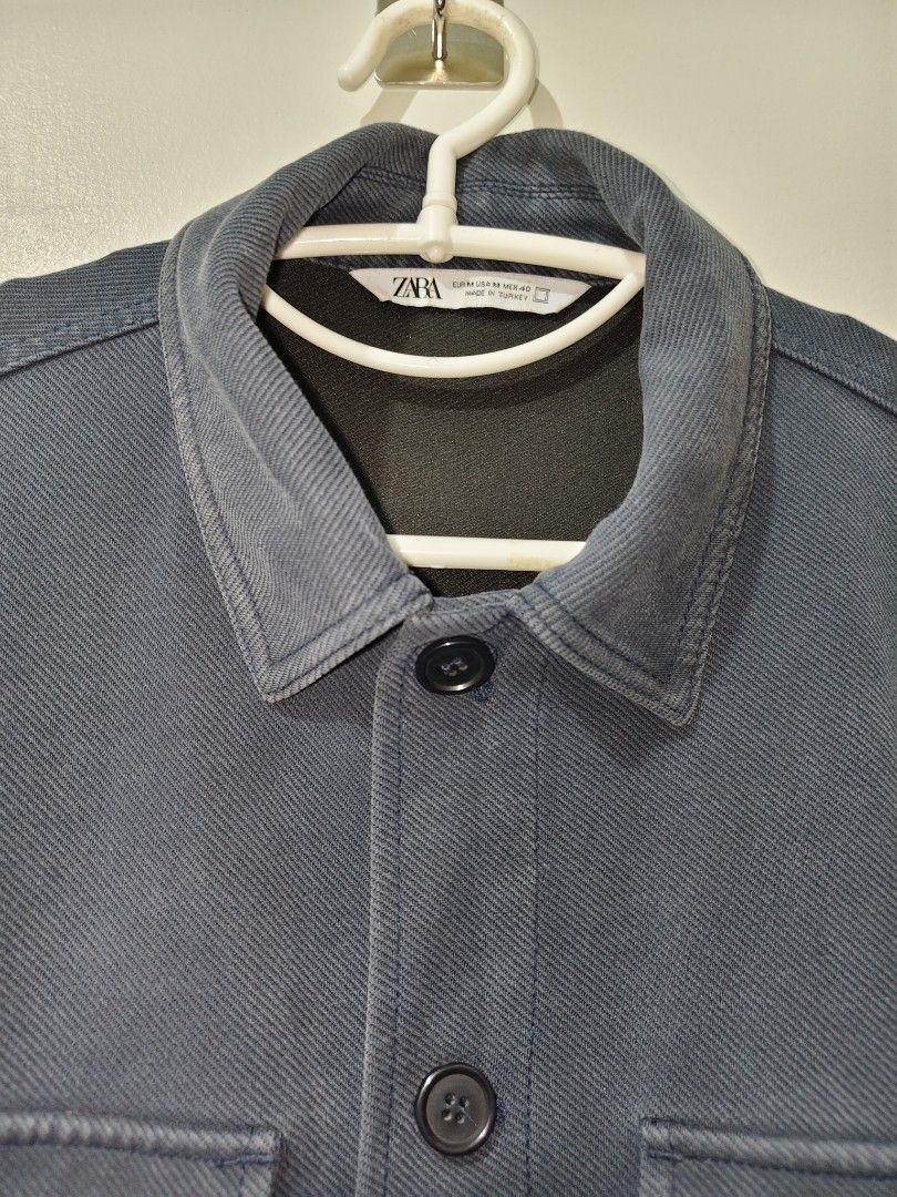 Zara Men's Denim Jacket / Overshirt (Category: Coats, Jackets and Outerwear) located in Lipa City. Submitted by gerardcala51660 (Listing ID 1458071854, Image 3). Description: Zara Men's Denim Jacket / Overshirt Medium on tag Dimensions: 23 inches x 27 inches Excellent condition (thrifted) – Needs wash – Color may vary slightly due to lighting Quality Zara denim jacket in clean slate blue wash. Classic design that pairs easily with any outfit. Str