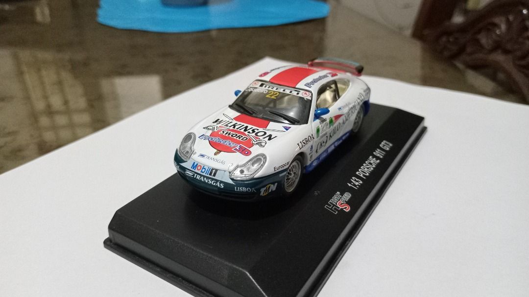 Porsche 911 GT3 Diecast Model Car (Category: Vehicle & Diecast Models) located in Iloilo. Submitted by cdex.200300 (Listing ID 1458187332, Image 3). Description: • 1:43 Scale Model • PORSCHE 911 GT3 Die Cast Model SC 1:43High Speed Brand • Comes in original acrylic protective case • Highly detailed model • Perfect for Porche collectors and enthusiasts Note: The shipping fee is not included and will be calculated based on your location. .