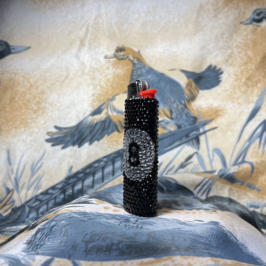 8 Ball Lighter (Category: Vintage Collectibles) located in Quezon City. Submitted by chikinita (Listing ID 1458256471, Image 2). Description: -Instagram: Claymado - Custom black lighter adorned with sparkling rhinestones. - Features a unique clear 8-ball design on the front. - Refillable for long-lasting use. - Perfect for personal style or as a fun, eye-catching gift..