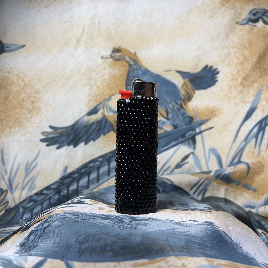 8 Ball Lighter (Category: Vintage Collectibles) located in Quezon City. Submitted by chikinita (Listing ID 1458256471, Image 3). Description: -Instagram: Claymado - Custom black lighter adorned with sparkling rhinestones. - Features a unique clear 8-ball design on the front. - Refillable for long-lasting use. - Perfect for personal style or as a fun, eye-catching gift..