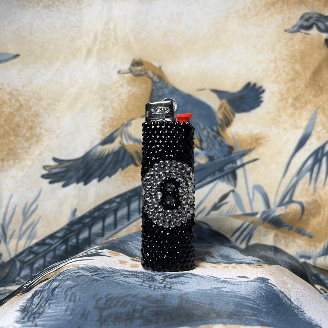 8 Ball Lighter (Category: Vintage Collectibles) located in Quezon City. Submitted by chikinita (Listing ID 1458256471, Image 1). Description: -Instagram: Claymado - Custom black lighter adorned with sparkling rhinestones. - Features a unique clear 8-ball design on the front. - Refillable for long-lasting use. - Perfect for personal style or as a fun, eye-catching gift..