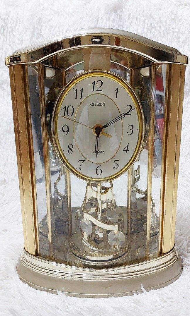 ✨ Citizen Crystal Table Clock ✨ (Category: Clocks) located in Binan City. Submitted by sakuratreasuresph (Listing ID 1458151598, Image 2). Description: ✨ Citizen Crystal Table Clock ✨ A stunning statement piece for your home or office! ⏰✨ 💎 Citizen Quartz Clock 🌟 Beautiful gold-tone finish with crystal-inspired accents 🪞 Clear glass-style panels showcasing the intricate interior ✨ Decorative rotating/crystal pendulum design 🕰️ Classic easy-to