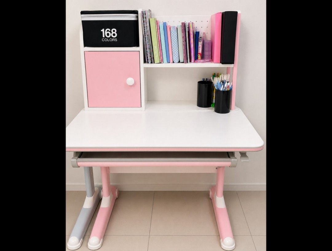 Adjustable Children's Study Desk with Storage and chait - Pink and White (Category: Tables & Sets) located in Quezon City. Submitted by flowercharm (Listing ID 1458206627, Image 1). Description: - Adjustable height to grow with your child - Built-in shelf with organizers - Small cabinet for storage - Cheerful pink and white design with pink chair adjustable - Includes pull-out keyboard tray - Ideal for homework, crafts, and kids' rooms.