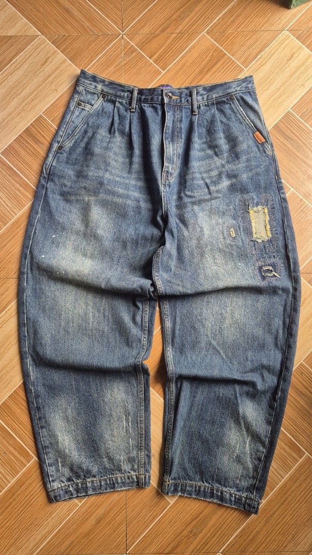 Aftermaths Baggy Denim Jeans - Size XL (Category: Jeans) located in Iloilo. Submitted by heyjay10 (Listing ID 1458125018, Image 1). Description: - Baggy denim jeans from Aftermaths - Size XL - Distressed look with patches and paint splatters - Unique buckle strap at the back for adjustable fit - Amekaji Vibes Waist - 17 inch 33-34 Rise -13 inch Length- 40 inch Leg opening - 9 inch .