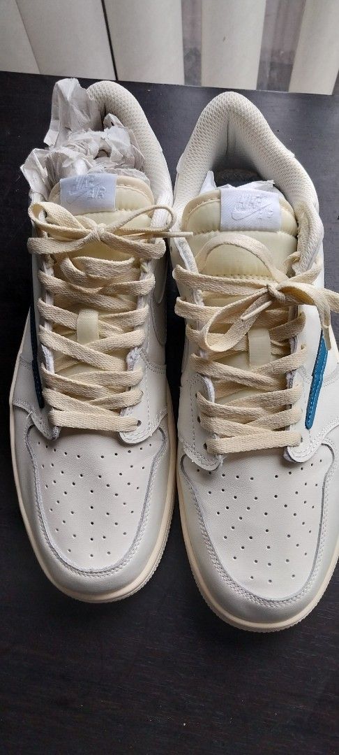 Air Jordan 1 Low SE Travis Scott (Category: Sneakers) located in Cainta. Submitted by detheos7 (Listing ID 1458119044, Image 1). Description: -Negotiable Price -no box - Air Jordan 1 Low SE Travis Scott - Colorway: Sail with a striking Blue Swoosh - Size: US 11 / EUR 45 - Includes original laces - Ideal for casual wear and everyday comfort.