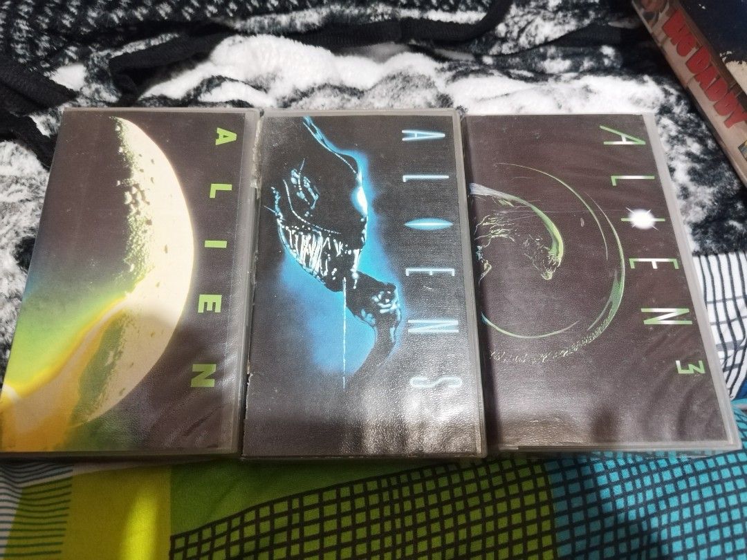 Alien VHS Movie Collection (Category: CDs & DVDs) located in Manila. Submitted by pickerjessie (Listing ID 1458218135, Image 1). Description: - Original Alien Movie Trilogy on VHS - Includes: Alien, Aliens, Alien 3 - Tapes from Viva Video & 20th Century Fox Home Entertainment - Ideal for collectors and classic sci-fi horror fans - Own these iconic films!.