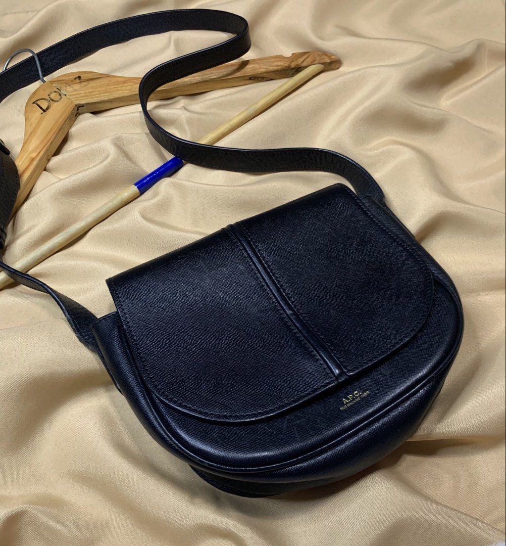 A.P.C. Black Leather Crossbody Bag (Category: Cross-body Bags) located in Polomolok. Submitted by domingthriftclothes (Listing ID 1458148696, Image 1). Description: - Authentic A.P.C. black leather crossbody bag - Classic saddle shape with secure flap closure - Adjustable strap for comfortable, customizable wear - Elegant gold-tone hardware accents - Minimalist and versatile design, ideal for daily use.