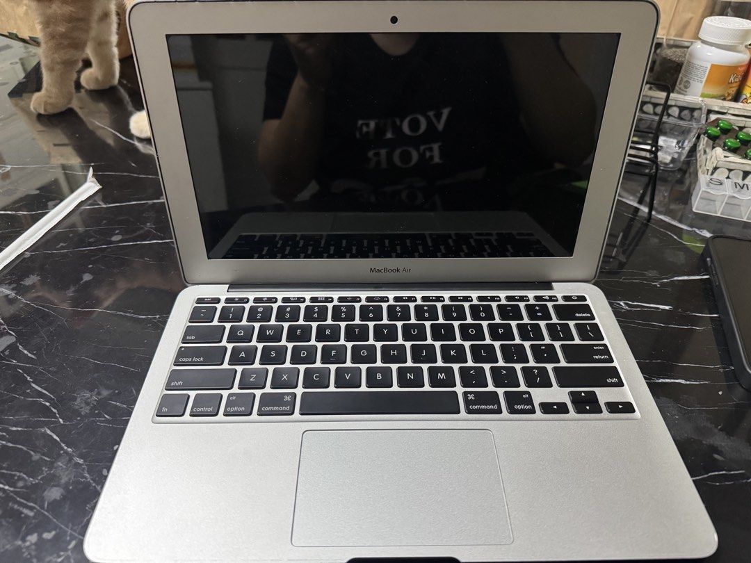 Apple MacBook Air Laptop (Category: Laptops & Notebooks) located in Makati City. Submitted by hotstuff00 (Listing ID 1458217175, Image 3). Description: - Reliable MacBook Air for everyday tasks - Clean and functional keyboard - Minor exterior wear, consistent with normal use - Ideal for students or portable computing needs - Charger included.