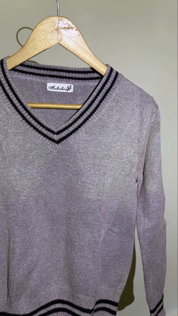 Ashishaa Grey V-Neck Sweater with Black Stripes (Category: Longsleeves) located in Cavite. Submitted by maxs.bl (Listing ID 1458140005, Image 3). Description: - Grey v-neck sweater - Black stripes on collar and hem - Long sleeves - Classic school uniform aesthetic - Versatile for layering or standalone wear - with stains but i think deep cleaning might help.