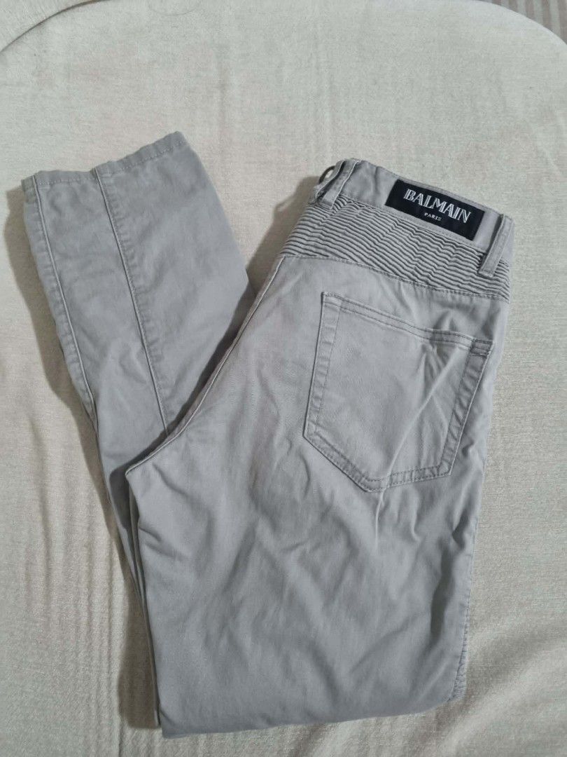 Authentic Balmain Paris Grey Moto Biker Pants (Category: Jeans) located in Pasig City. Submitted by jenahhanej (Listing ID 1458117408, Image 1). Description: AUTHENTIC BALMAIN PARIS BIKER PANTS Size: 32 Color: Light Grey Material: 100% Cotton - Made in Italy Fit: Slim biker cut with signature ruched thighs + zip pockets Condition: 8.5/10 - Worn but well maintained - Minor fray on back pocket only - see on pic - No stains, no tears, color is even 