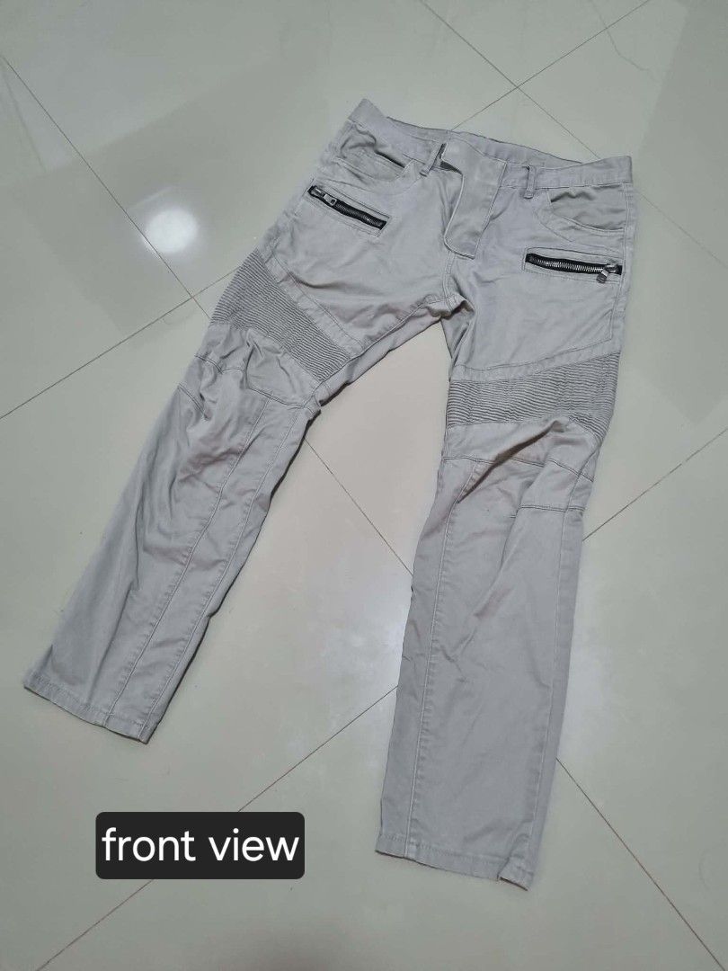 Authentic Balmain Paris Grey Moto Biker Pants (Category: Jeans) located in Pasig City. Submitted by jenahhanej (Listing ID 1458117408, Image 3). Description: AUTHENTIC BALMAIN PARIS BIKER PANTS Size: 32 Color: Light Grey Material: 100% Cotton - Made in Italy Fit: Slim biker cut with signature ruched thighs + zip pockets Condition: 8.5/10 - Worn but well maintained - Minor fray on back pocket only - see on pic - No stains, no tears, color is even 