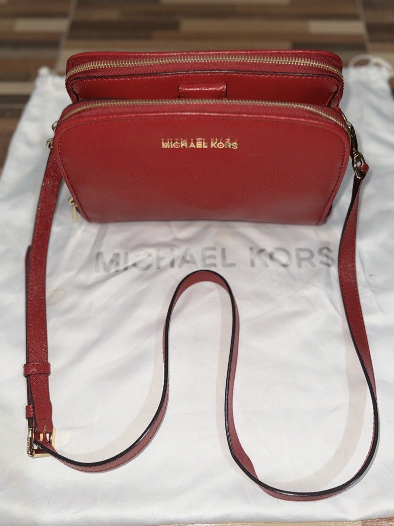 Authentic Michael Kors Jet Set Double-Zip Camera Bag – Lipstick Red (Category: Cross-body Bags) located in Quezon City. Submitted by clarakels (Listing ID 1458172906, Image 1). Description: Perfect compact companion! Genuine Michael Kors Jet Set Double-Zip Crossbody in a striking, rich lipstick red. Features a sturdy Saffiano leather finish and a smart two-compartment zipper layout to keep your daily essentials organized.Fitted with a matching re