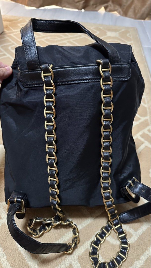 Authentic Prada Black Nylon Chain Backpack (Category: Luxury Bags & Wallets) located in Las Pinas. Submitted by marshmallowmax (Listing ID 1458178824, Image 3). Description: Guaranteed Authentic! Excellent used! Slightly used, no flaws. Med size no more inclusions.