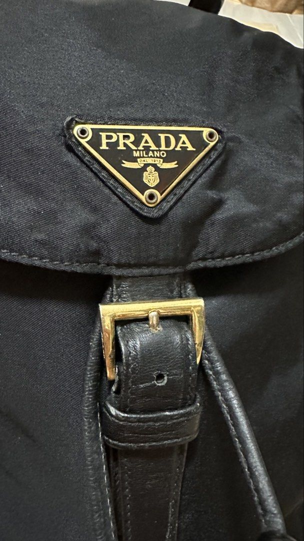 Authentic Prada Black Nylon Chain Backpack (Category: Luxury Bags & Wallets) located in Las Pinas. Submitted by marshmallowmax (Listing ID 1458178824, Image 2). Description: Guaranteed Authentic! Excellent used! Slightly used, no flaws. Med size no more inclusions.