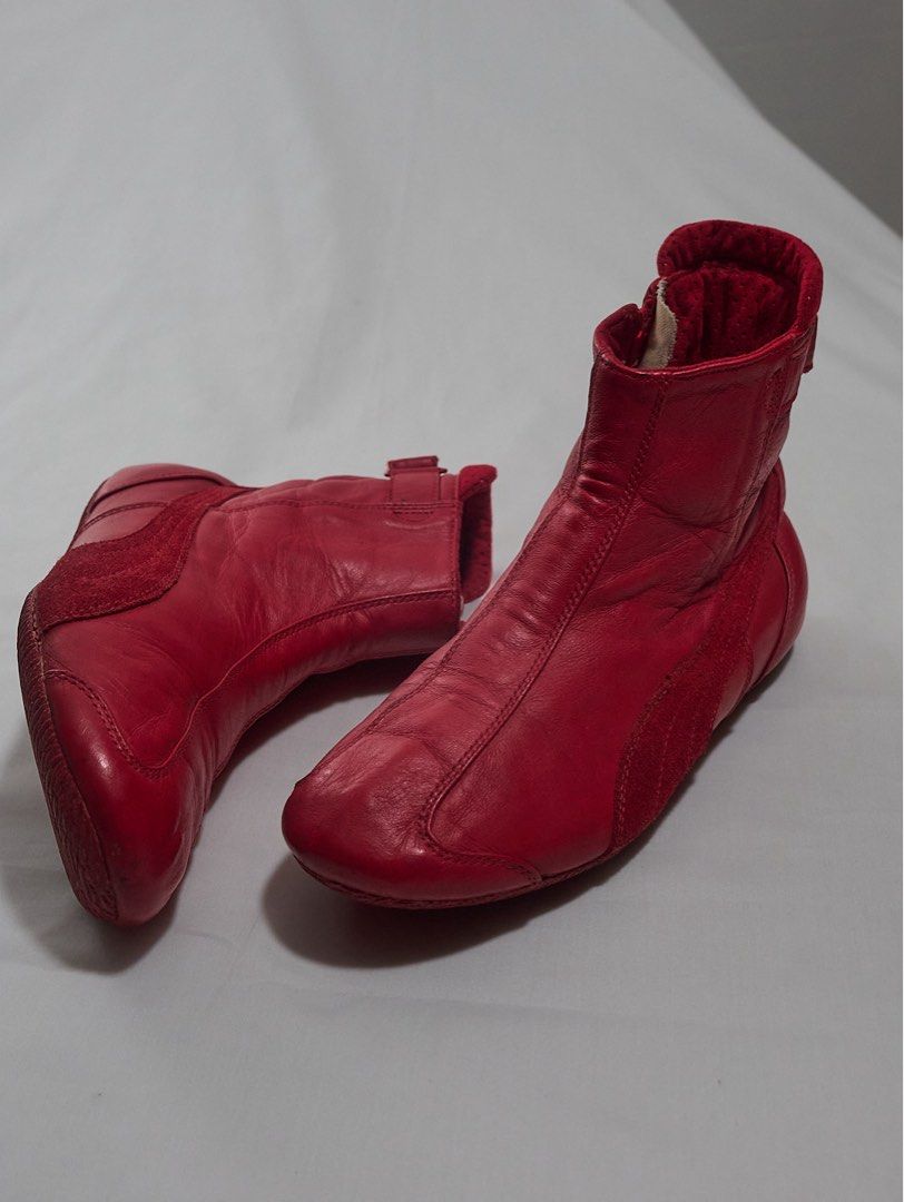 AW04 Puma—Red Leather Racing Boots (Category: Sneakers) located in Quezon City. Submitted by soourceph (Listing ID 1458115602, Image 2). Description: Before the speedcat phenom with pinterest baddies pulling off the same shein wide leg denims, Puma has been building its Motorsport legacy since the 90s This early 2000s offering greatly references the 1998 release of the Puma Speedcat. The ankle cut is complemented with zipper and velcro closure fo