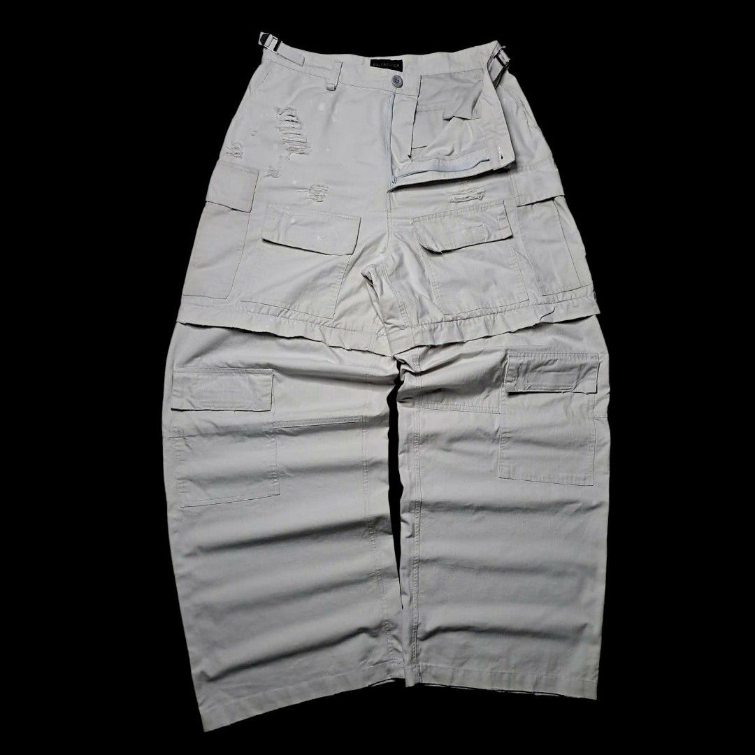 Balenciaga Convertible Cargo (Category: Luxury Apparel) located in Manila. Submitted by yaseen_73 (Listing ID 1458179696, Image 1). Description: Balenciaga Distressed Large Cargo Pants in light grey/beige cotton ripstop with heavy ripped and destroyed detailing - Medium - Waistline 34 Adjustbale - Front Thigh 15½ - Front Rise 16 - Leg Opening 12 - Length 44 - As New - Pre Owned or Best Offer ✅GCash Ready ❎COD 🛵Lalamove 🚚J&T Seller's Location : 