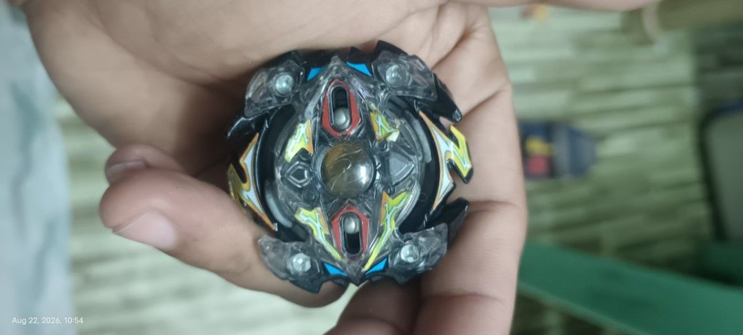 Beyblade Lot - 5 Beyblades (Category: Action & Battle Toys) located in Makati City. Submitted by livelion_c59905 (Listing ID 1458100788, Image 2). Description: - Lot of 5 Beyblades - Various designs and colors included - Great for Beyblade battles and collecting - Some show minor signs of play, but in good overall condition - Perfect for fans looking to expand their collection.