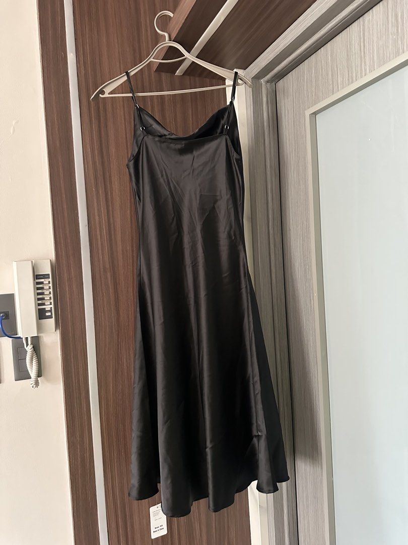 Black Satin Slip Dress (Category: Dresses) located in Quezon City. Submitted by adc2011 (Listing ID 1458150303, Image 3). Description: - Elegant black satin slip dress - Midi length - Delicate spaghetti straps - Flattering cowl neckline - Size XS - Made in China.