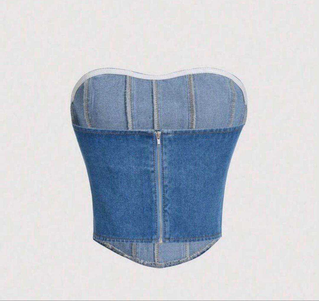 Blue Denim Corset Top with Zipper (Category: Others Tops) located in Valenzuela. Submitted by maggieberry (Listing ID 1458194245, Image 2). Description: - Strapless denim corset top - Front zipper closure - Made from mixed blue denim washes - Structured bodice for a flattering fit - Perfect for dressing up or down.