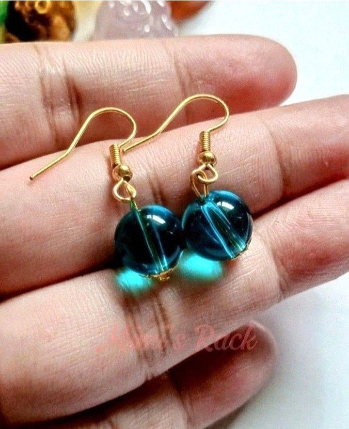 BLUE QUARTZ DANGLING EARRINGS (Category: Earrings) located in Taguig. Submitted by mimisrack (Listing ID 1458147328, Image 1). Description: 💙Blue Quartz is often chosen for calmness, clarity, focus, communication, emotional balance, and positive energy. 🧿 Bead size: 10mm 💎Gems & crystals are energized and cleansed before shipping. 💎As these gemstones are natural, some beads may have blemishes, impurities, chips, cracks or other imperfections.