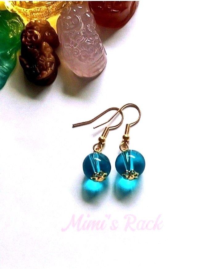 BLUE QUARTZ DANGLING EARRINGS (Category: Earrings) located in Taguig. Submitted by mimisrack (Listing ID 1458147328, Image 3). Description: 💙Blue Quartz is often chosen for calmness, clarity, focus, communication, emotional balance, and positive energy. 🧿 Bead size: 10mm 💎Gems & crystals are energized and cleansed before shipping. 💎As these gemstones are natural, some beads may have blemishes, impurities, chips, cracks or other imperfections.