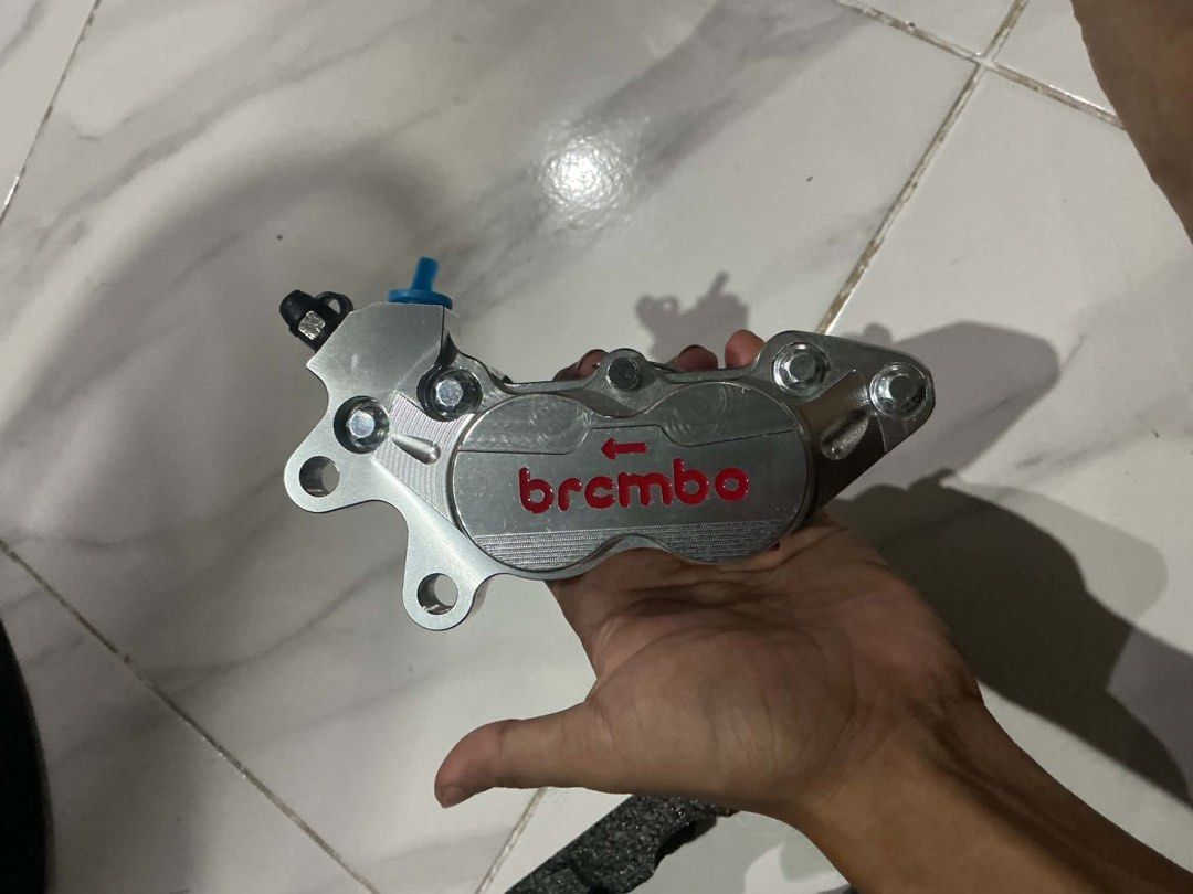 Brembo Silver Brake Caliper (Category: Construction Tools & Equipment) located in Manila. Submitted by altheaeloi27664 (Listing ID 1458119581, Image 2). Description: - Genuine Brembo brake caliper - Sleek silver finish with iconic red Brembo logo - High-performance look, perfect for motorcycles or similar vehicles - Comes complete with mounting bolts - Ready for immediate installation.