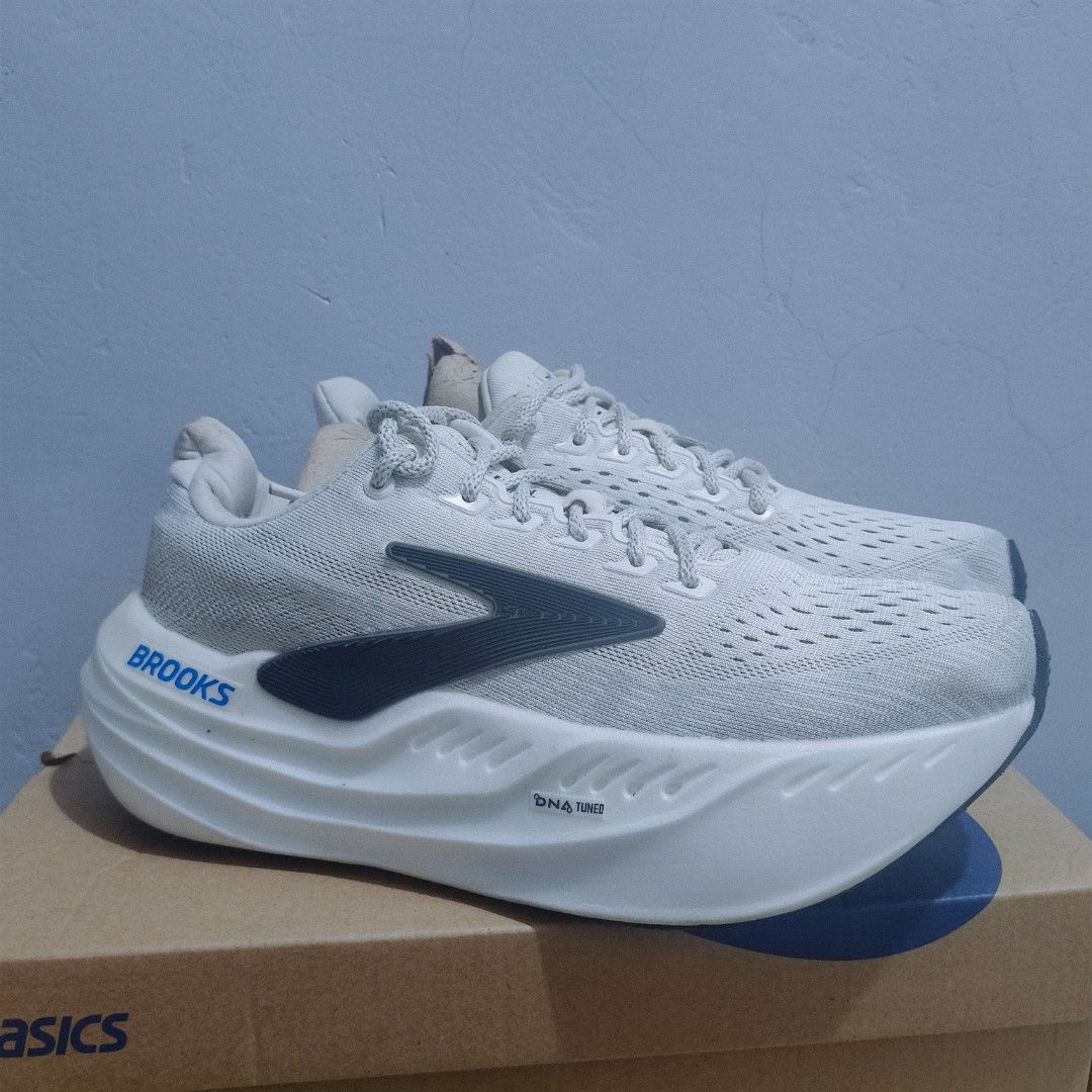 Brooks DNA Tuned Running Shoes (Category: Sneakers) located in Consolacion. Submitted by carlonolas91079 (Listing ID 1458144545, Image 1). Description: - Light grey Brooks running shoes - DNA Tuned cushioning for comfort - Breathable mesh upper - Ideal for running and everyday wear - Size: 8.5 US Men's EURO 42.5, 26.5CM - Made in Vietnam.