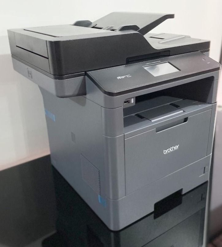 Brother MFC Laser Printer (Category: Printers, Scanners & Copiers) located in Caloocan City. Submitted by copiermach60483 (Listing ID 1458168227, Image 1). Description: - Brother MFC Laser Printer - Functions: Print, Copy, Scan - Features: Front USB port - Condition: Tested and working - Perfect for: Home or office use.