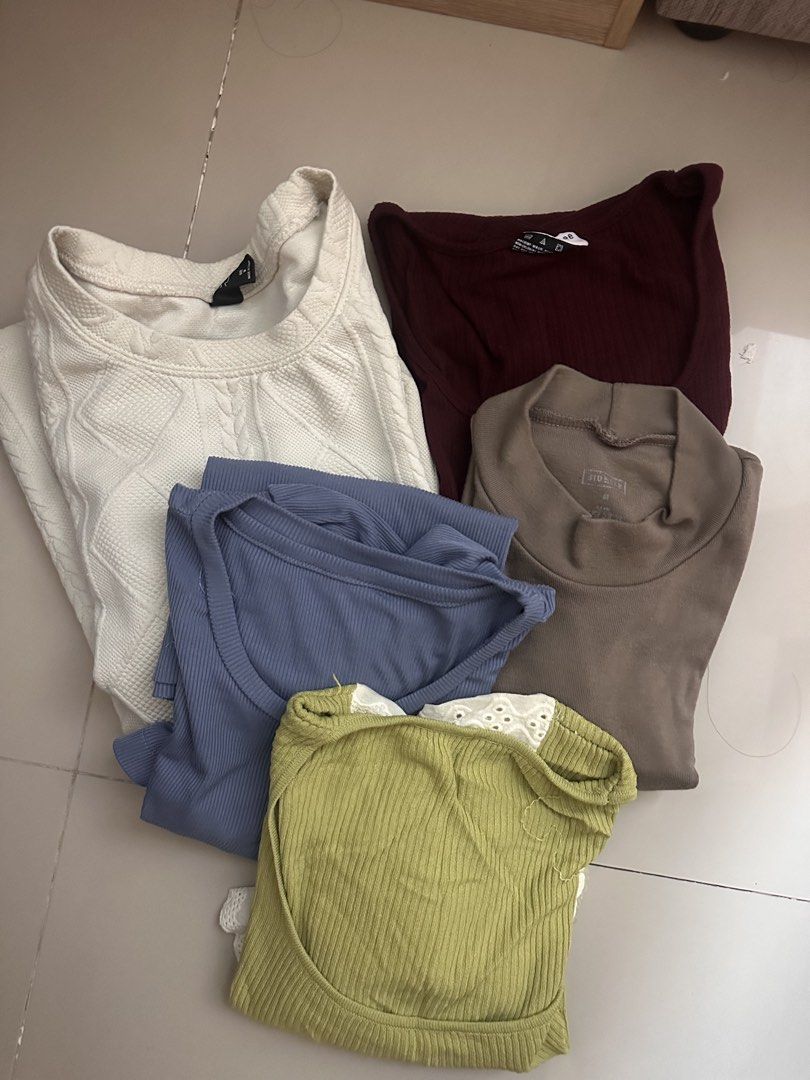 Bundle of 5 Tops - Various Brands & Colors (Category: Blouses) located in Manila. Submitted by cazly (Listing ID 1458228872, Image 2). Description: All in good condition! Negotiable. Message me for last price - Bundle of 5 tops - Includes: white cable knit sweater, maroon long-sleeve top, blue ribbed top, taupe turtleneck, and lime green ribbed top with eyelet details - Perfect mix for your wardrobe - All tops are folded neatly - Great bundle dea
