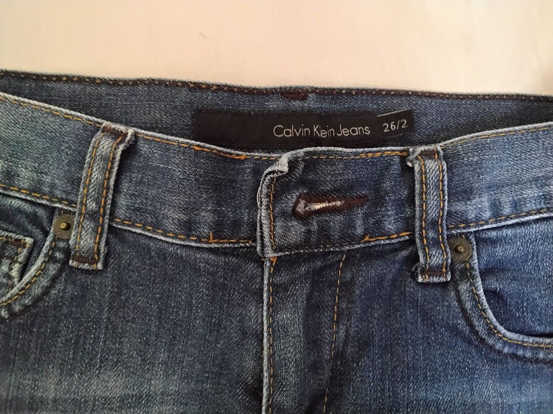 Calvin Klein Jeans short (ORIGINAL) (Category: Shorts) located in Puerto Princesa. Submitted by enjeruru (Listing ID 1458132063, Image 2). Description: Calvin Klein Jeans denim cutoff shorts featuring a medium blue wash and a distressed, raw frayed hem ORIGINAL PRICE: $70 from US🇺🇸 Size: sizing 26/2 Features: classic five-pocket styling, contrast stitching, and standard belt loops. RFS: Hindi na po kaysa sa akin... I GAINED WEIGHT 😅.