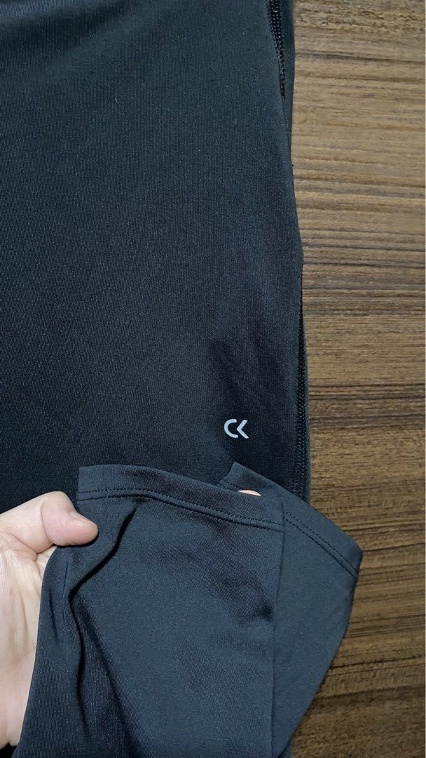 Calvin Klein Performance Black Leggings Size M (Category: Activewear) located in Naga. Submitted by cozydapper (Listing ID 1458146886, Image 3). Description: - Black Calvin Klein Performance leggings - Features iconic CK logo on left thigh - "Calvin Klein" branding on the waistband - Made in Vietnam - Ideal for workouts, gym sessions, or casual everyday wear.