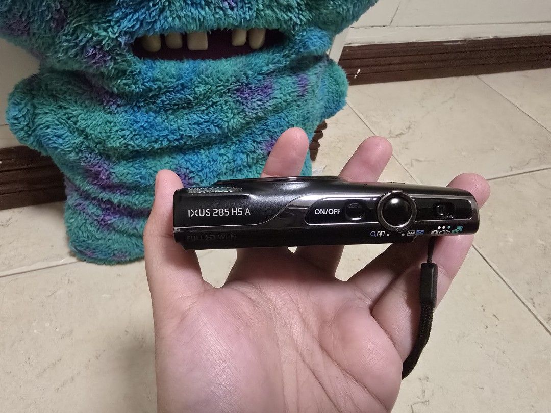 CANON IXUS 285 HS (WIFI) (Category: Cameras) located in Quezon City. Submitted by queendiaz (Listing ID 1458198743, Image 2). Description: FOR SALE: Canon IXUS 285 HS Digital Camera (wifi) Price: ₱21k Slightly negotiable / Fixed price ✨ DETAILS: • Canon IXUS 285 HS • 20.2MP CMOS Sensor • 12x Optical Zoom • Full HD 1080p Video • Wi-Fi & NFC • Compact and lightweight — perfect for travel & everyday photos INCLUSIONS: • Canon IXUS 285 HS Camera • Or