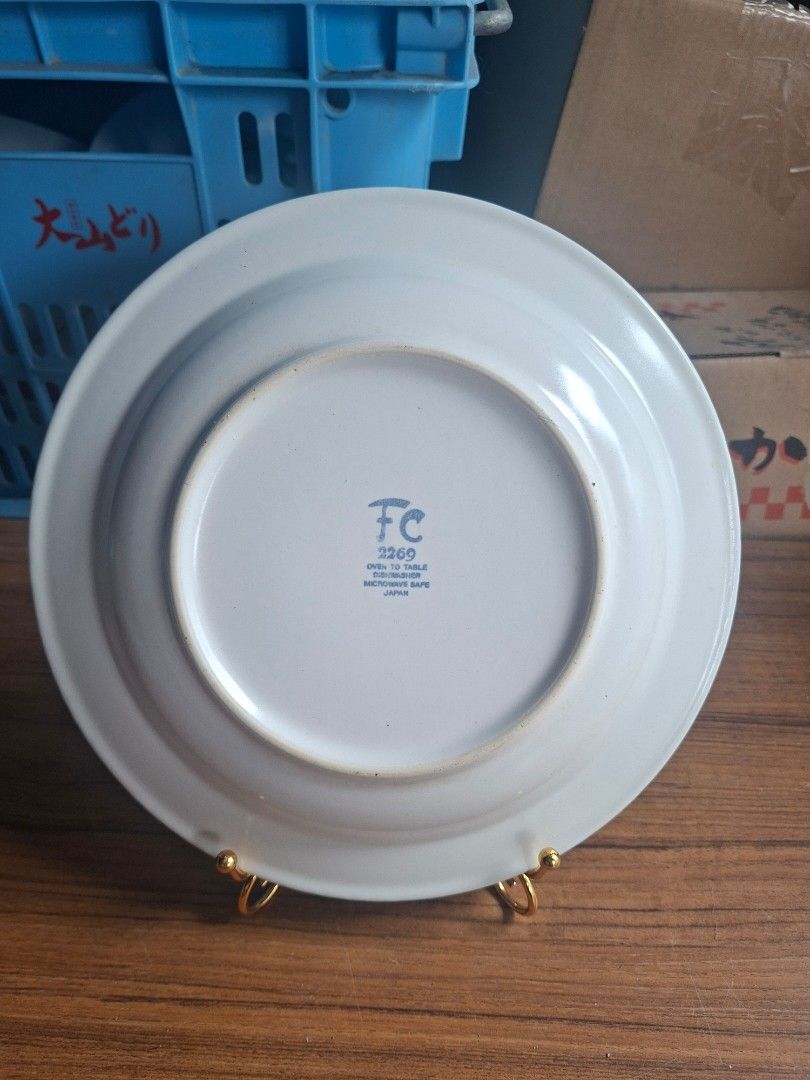 Ceramic Dinner Plate Set of 2 (Category: Other Kitchenware & Tableware) located in Consolacion. Submitted by luxekerei (Listing ID 1458157194, Image 2). Description: - ceramic decorative plate featuring a white center and a patterned rim with alternating pink and green vertical stripes. - 23.5cm in diameter ; 2.5cm deep.