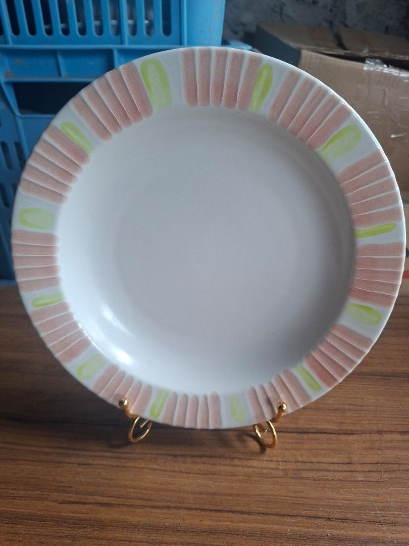 Ceramic Dinner Plate Set of 2 (Category: Other Kitchenware & Tableware) located in Consolacion. Submitted by luxekerei (Listing ID 1458157194, Image 1). Description: - ceramic decorative plate featuring a white center and a patterned rim with alternating pink and green vertical stripes. - 23.5cm in diameter ; 2.5cm deep.