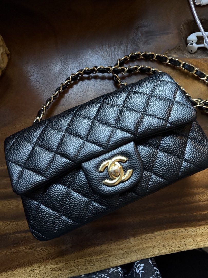 Chanel Classic Flap Bag Mini (Category: Luxury Bags & Wallets) located in Manila. Submitted by just_n (Listing ID 1457990402, Image 3). Description: - Classic Chanel flap bag - Black caviar leather - Gold hardware - Iconic quilted design - in pristine condition .