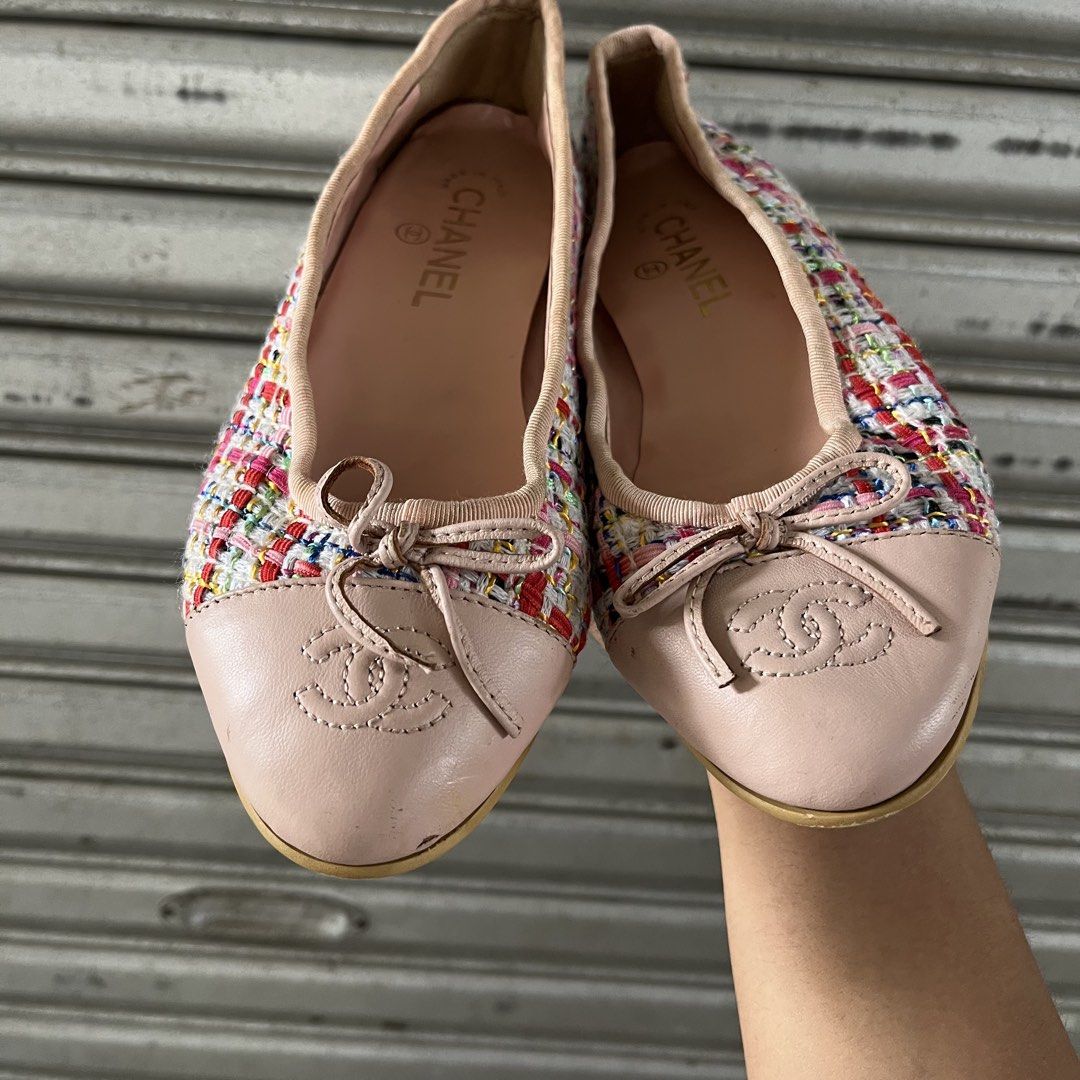 Chanel Tweed Ballet Flats (Category: Flats & Sandals) located in Sagbayan (Borja). Submitted by lunapawpaw46843 (Listing ID 1458128887, Image 3). Description: - Chanel ballet flats - Tweed material with pink leather cap toe - Adorable small bow and iconic CC logo detail - Comfortable pink insole with Chanel branding - Expertly made in Italy - Perfect for elevating both casual and dressy looks.